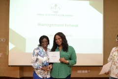 Mrs.-Rhoda-Mando-Head-Audit-and-MD-REA-during-certificate-presentation