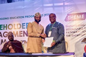 Olufemi Akinyelure - Head, Nigeria Electrification Project, REA, shakes hands with Prof. Ikpeme Ikpeme - Chief Medical Director, University of Calabar Teaching Hospital during the Collaboration Agreement Signing a