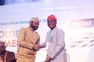 Olufemi Akinyelure - Head, Nigeria Electrification Project, REA, shakes hands with Prof. Kehinde Olusola Babatunde, Vice-Chancellor, FUNAAB, during the Collaboration Agreement Signing Ceremony at the EEP Stakehold